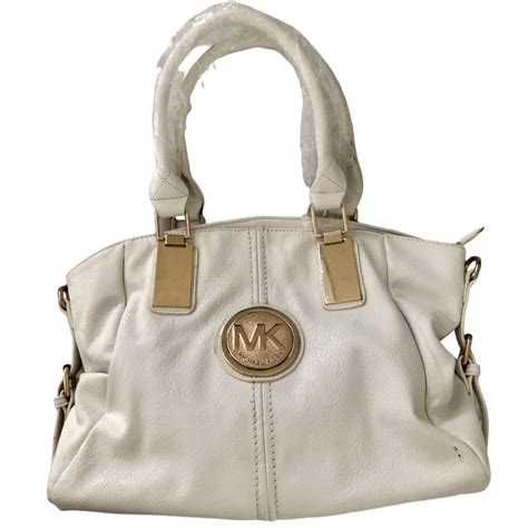 white michael kors purse with flowers|Michael Kors white shoulder bag.